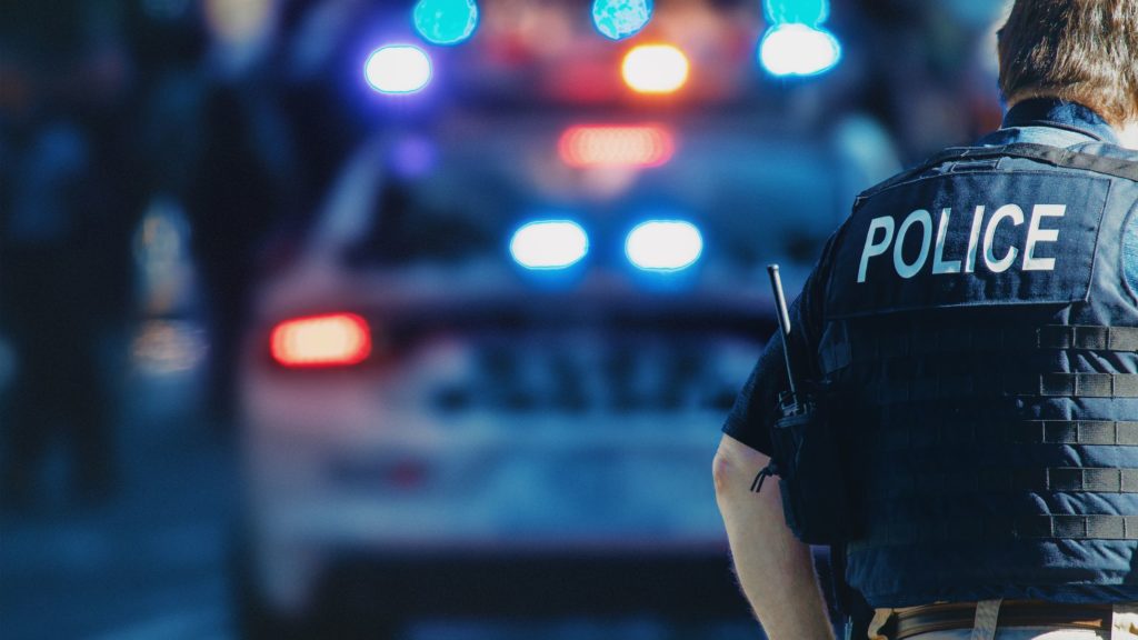 a photo of a police and a police car